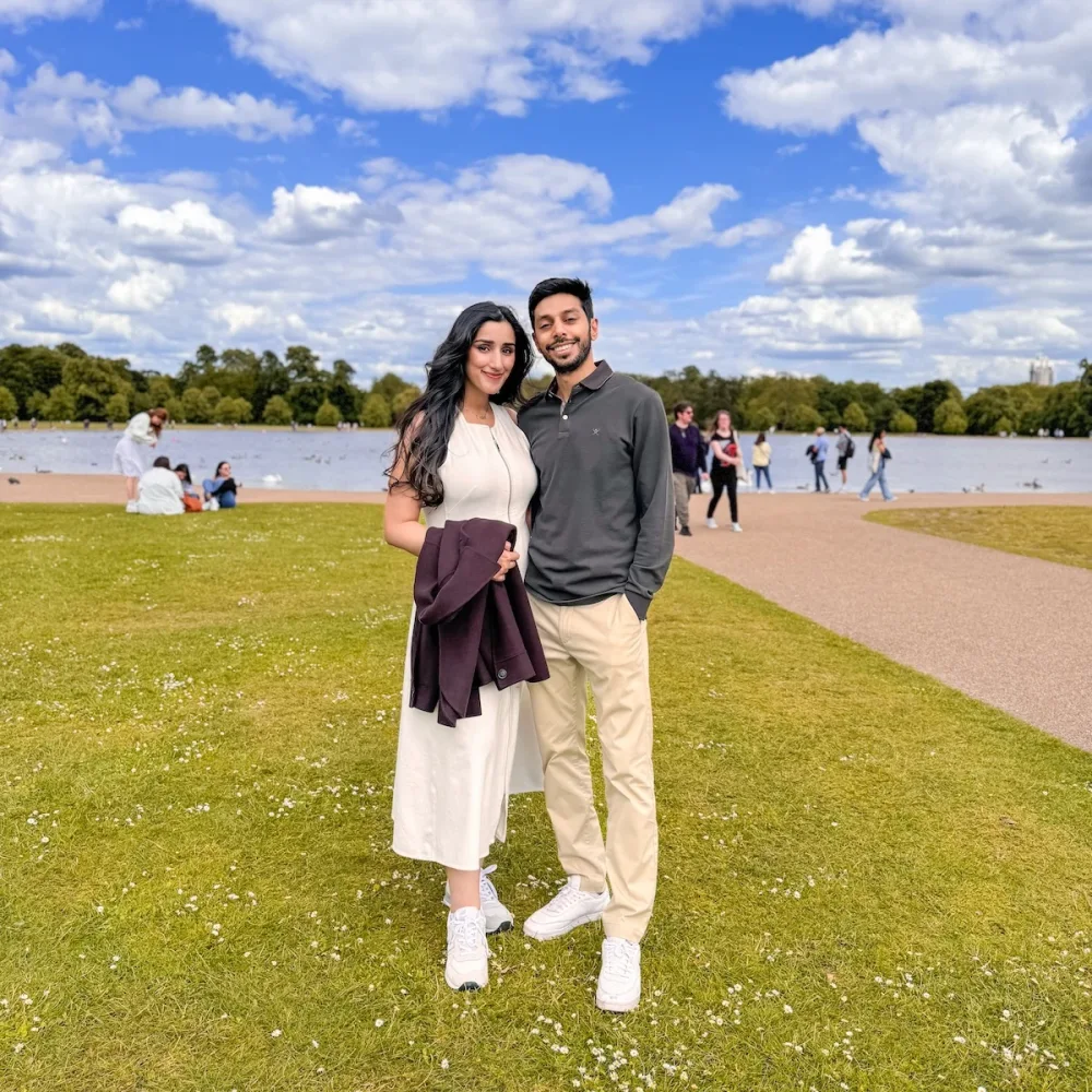Zoha and her husband Shahzeb standing together in a park