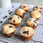 8 lemon blueberry muffins on a wire rack