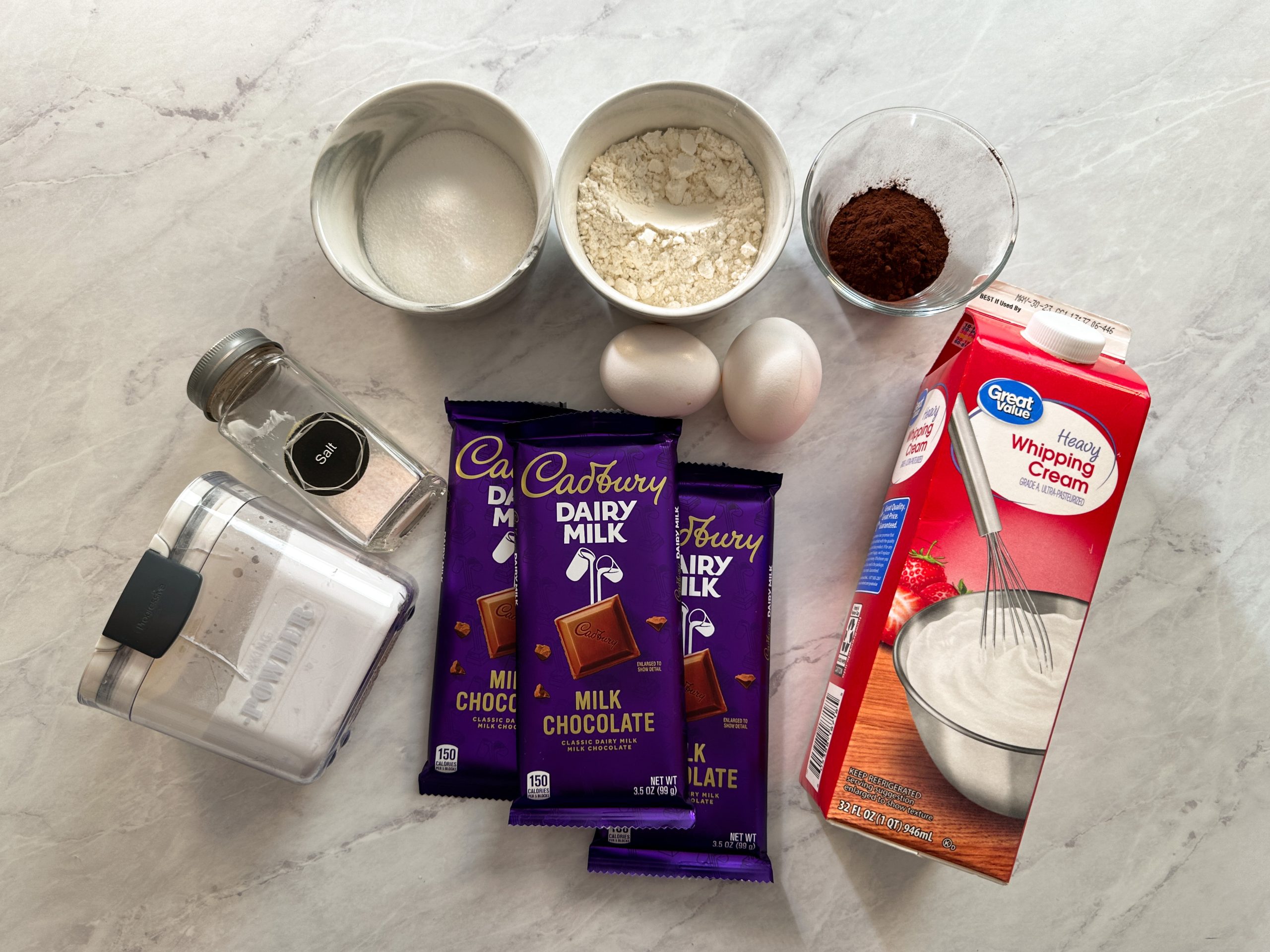 overhead picture of all ingredients needed to make chocolate mousse cake