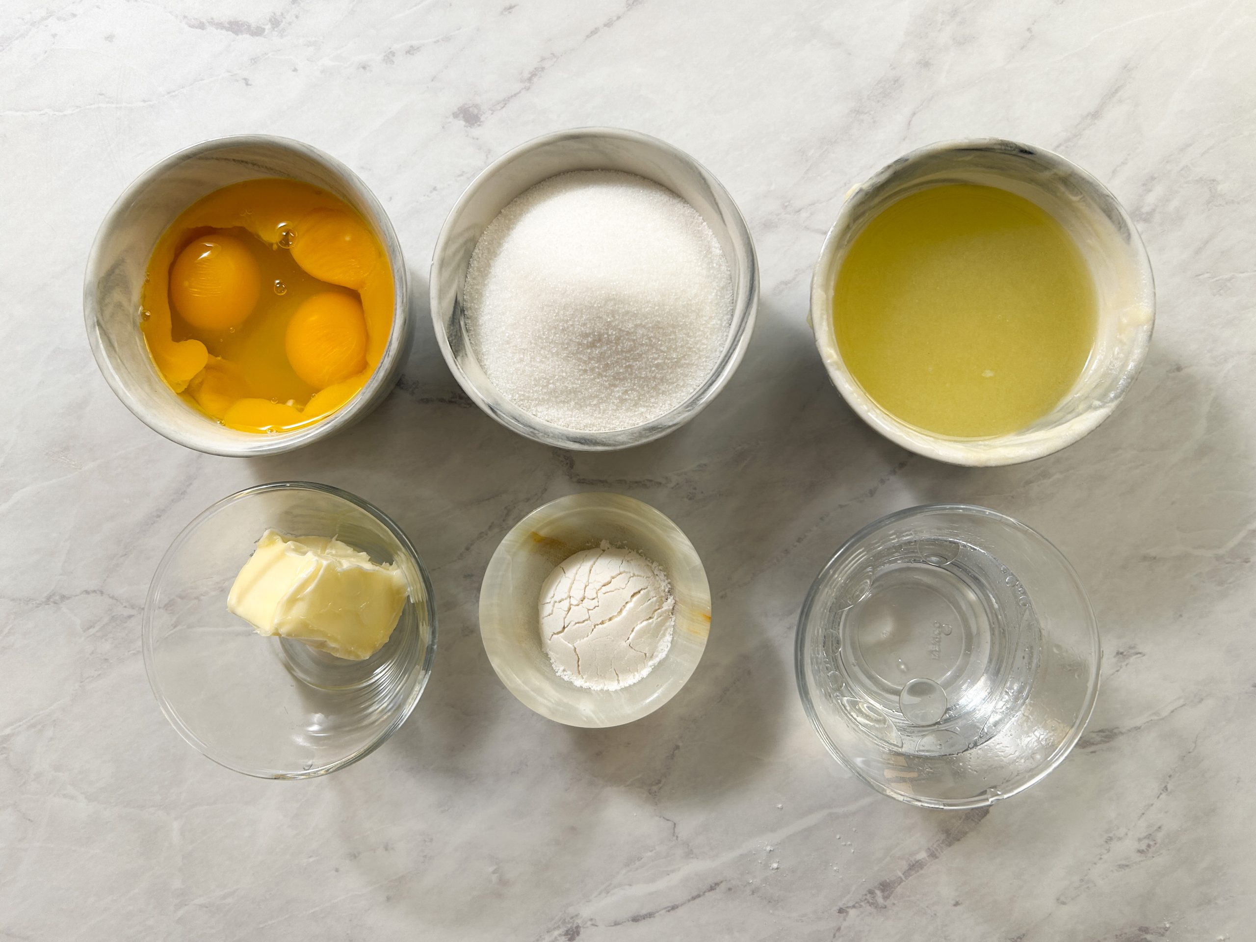 lemon curd ingredients: lemons, eggs, sugar, water, butter