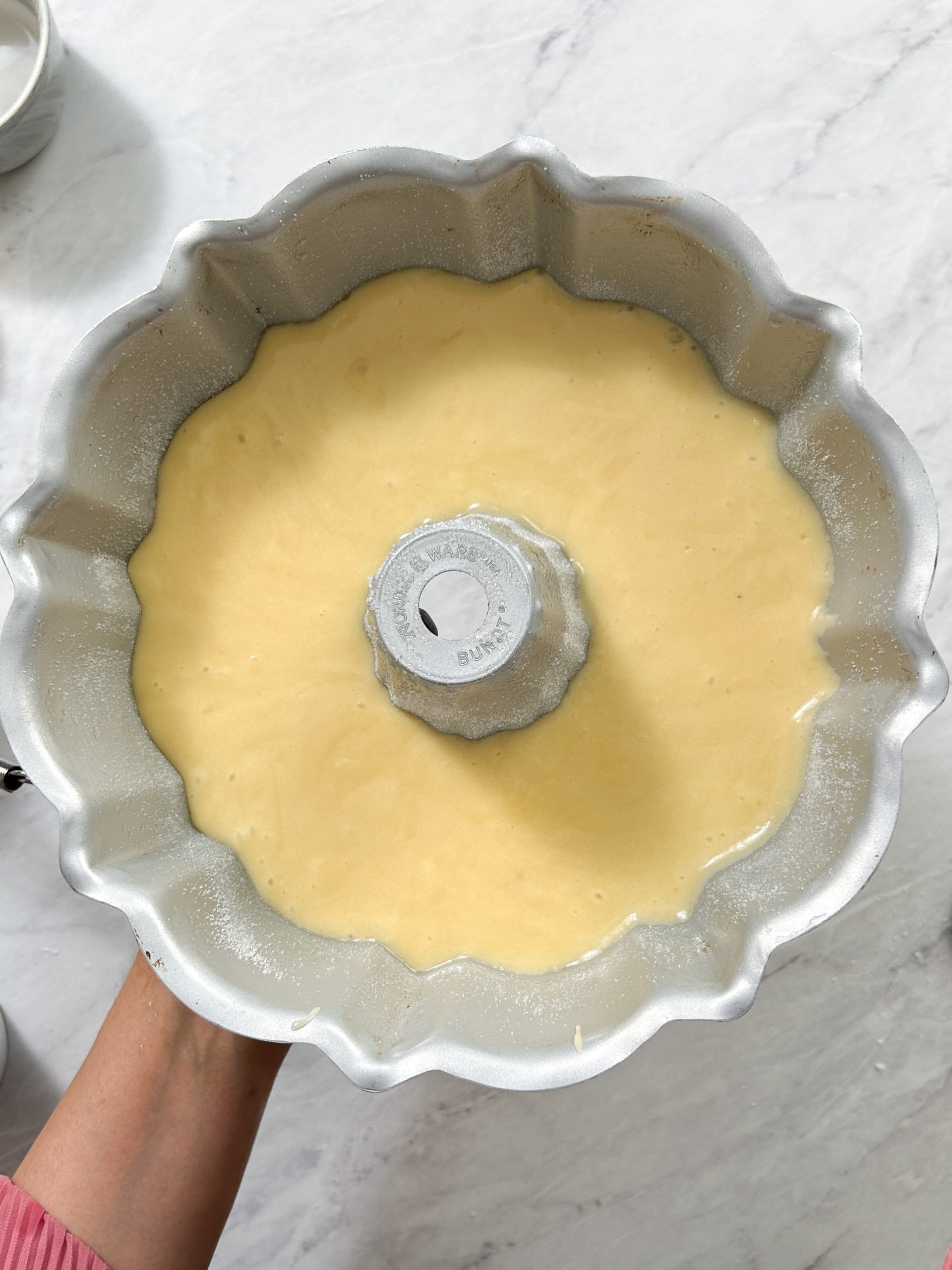 bundt pan filled with cake batter