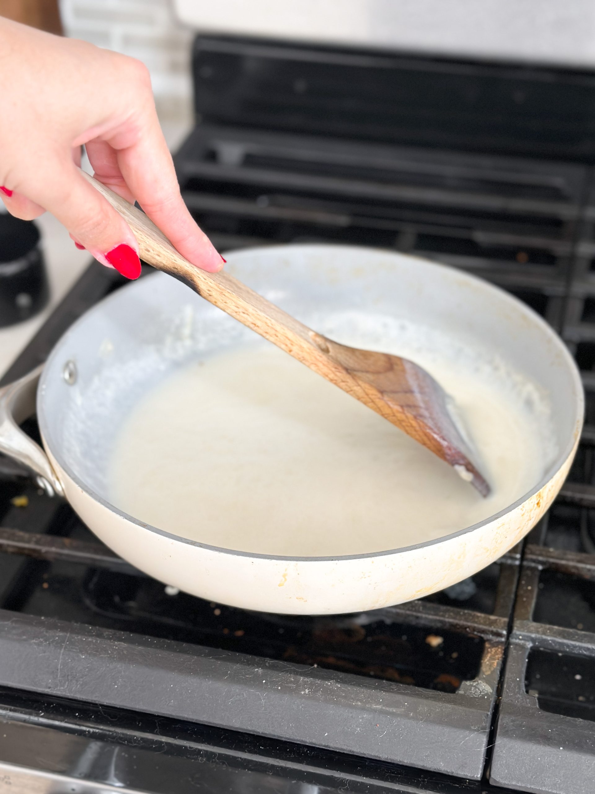 milk and flour in a nonstick saucepan on the stove