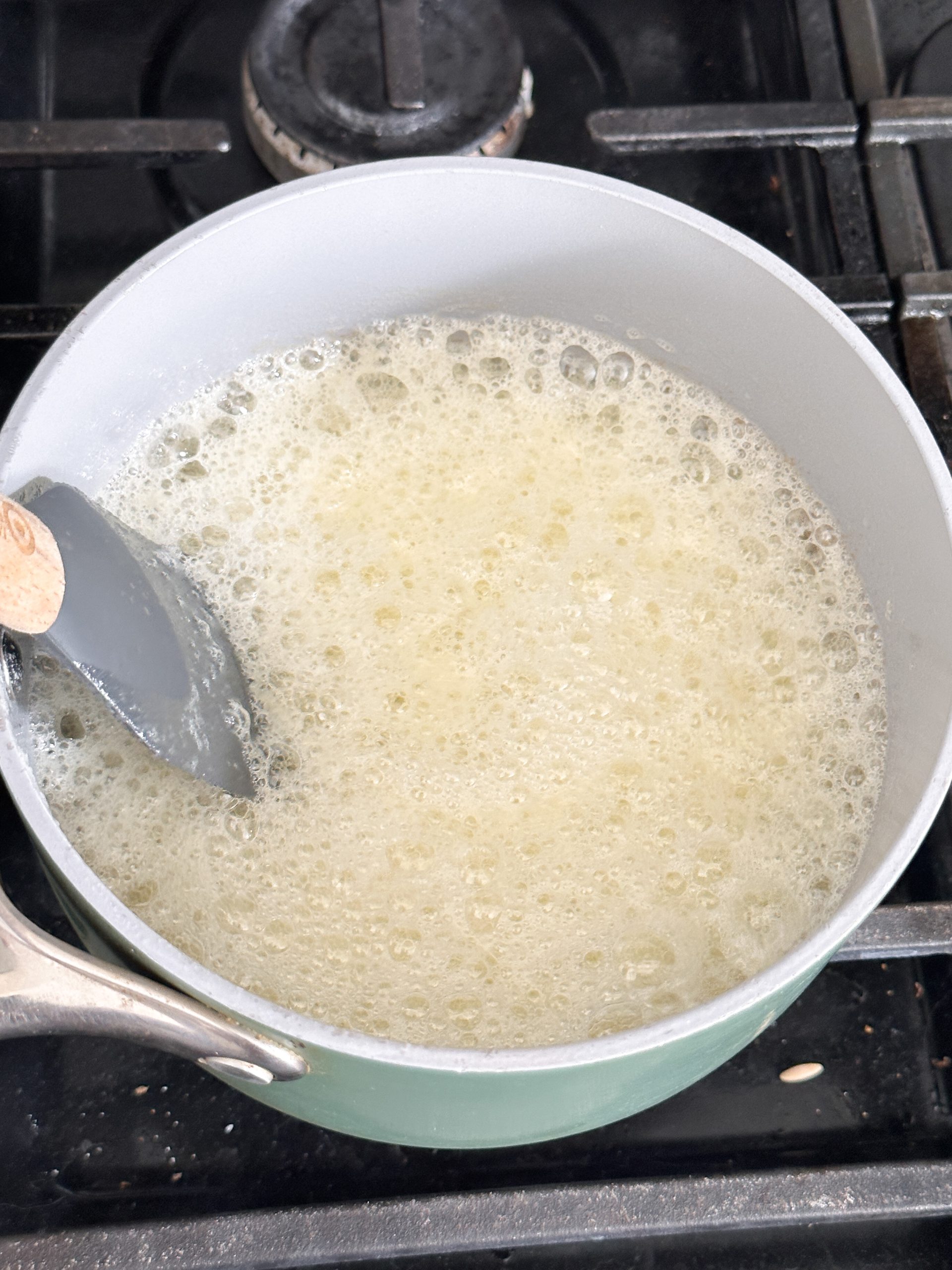 butter melted and foaming in a nonstick sauce pan