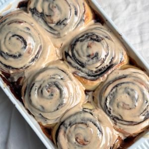 six chocolate espresso rolls covered with coffee icing