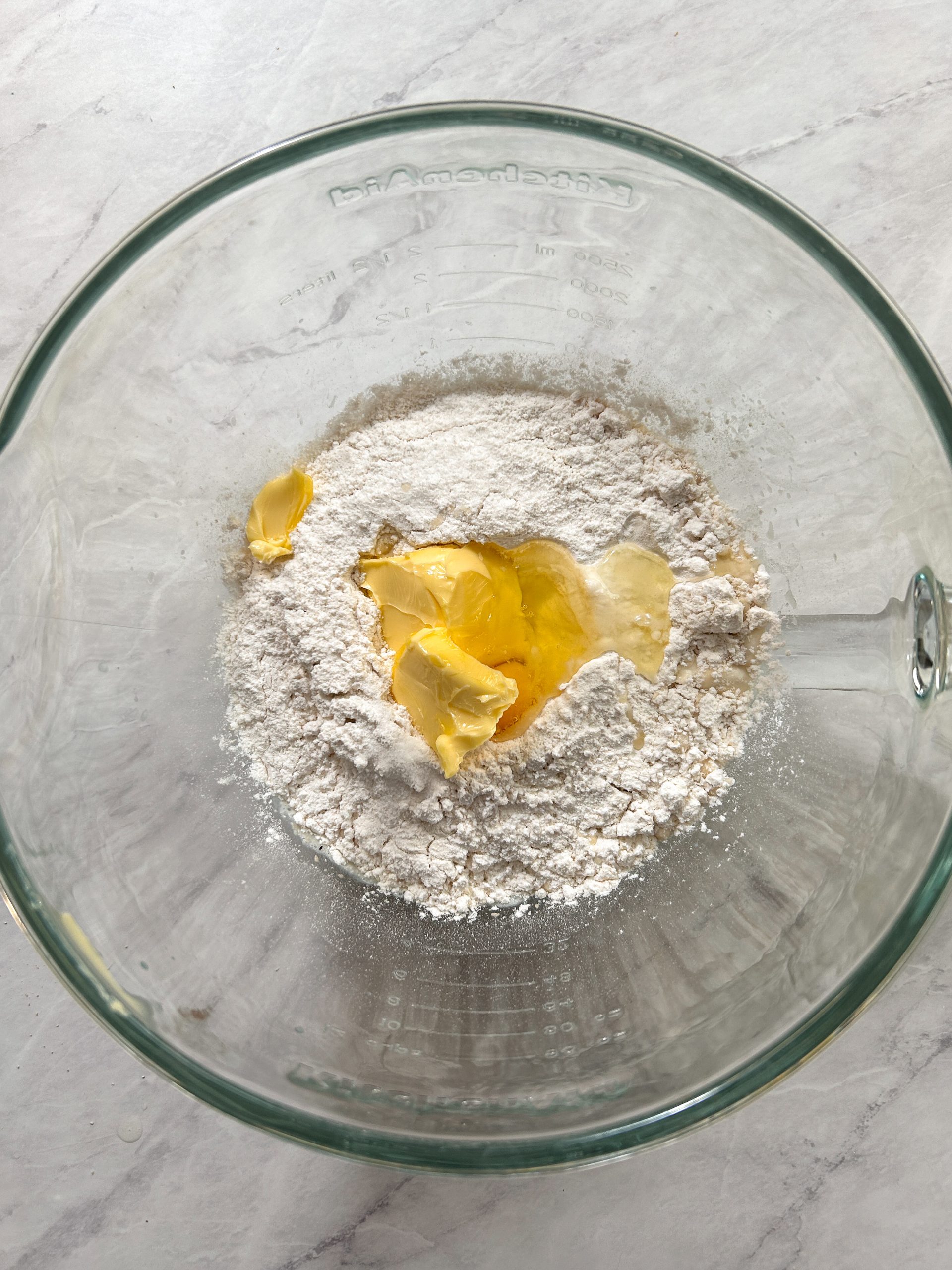 dough ingredients in a glass bowl