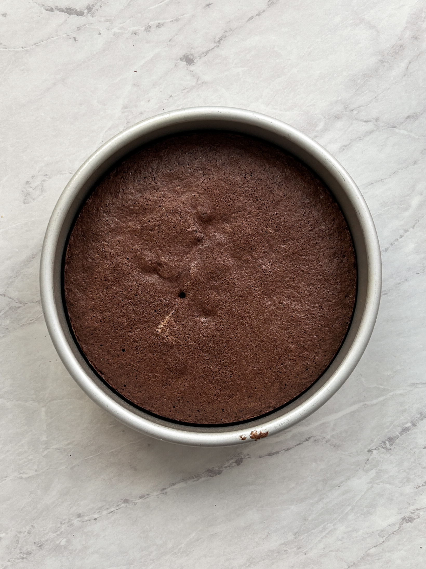 baked chocolate cake in a cake pan