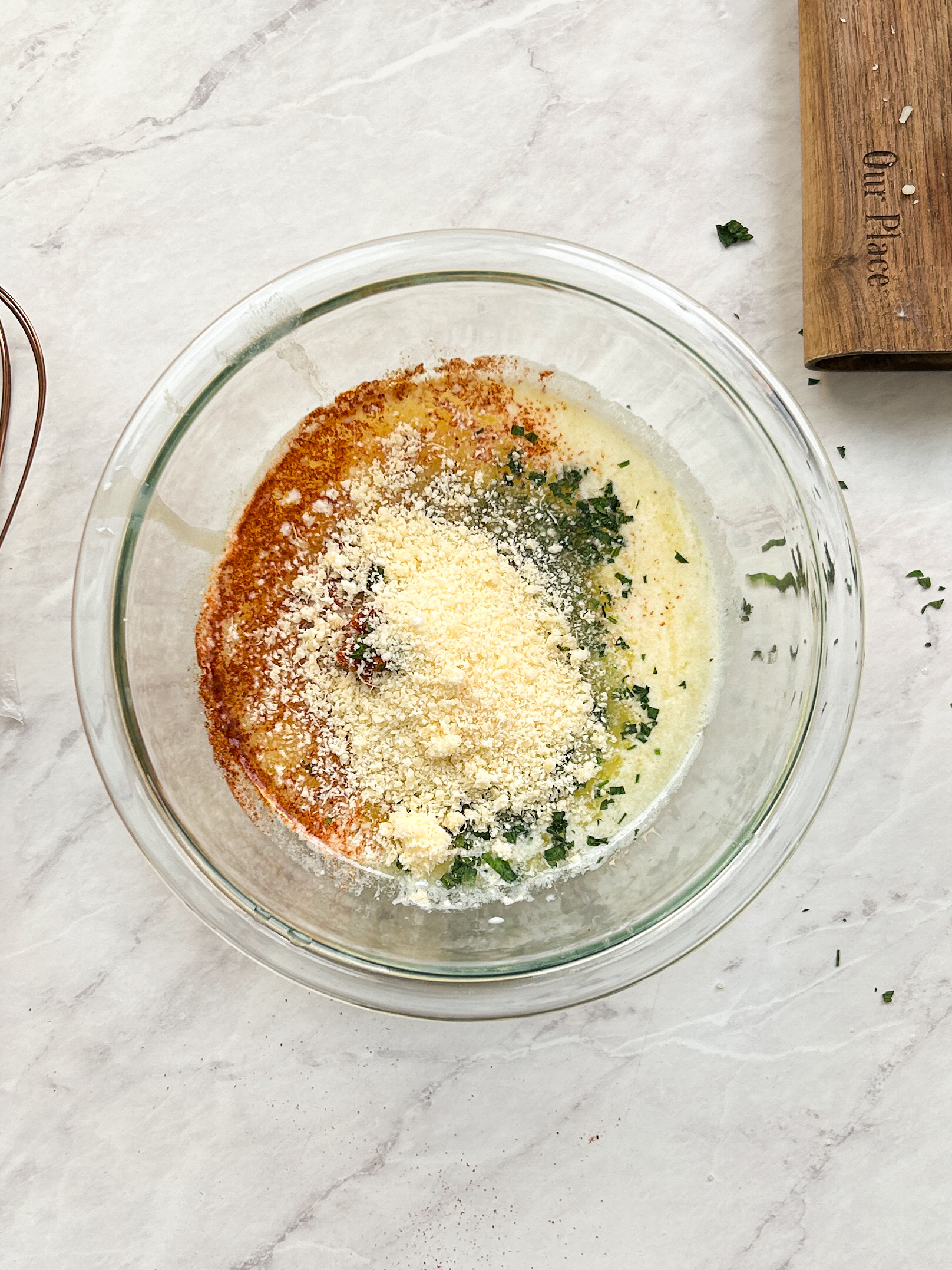garlic butter custard ingredients in a glass bowl