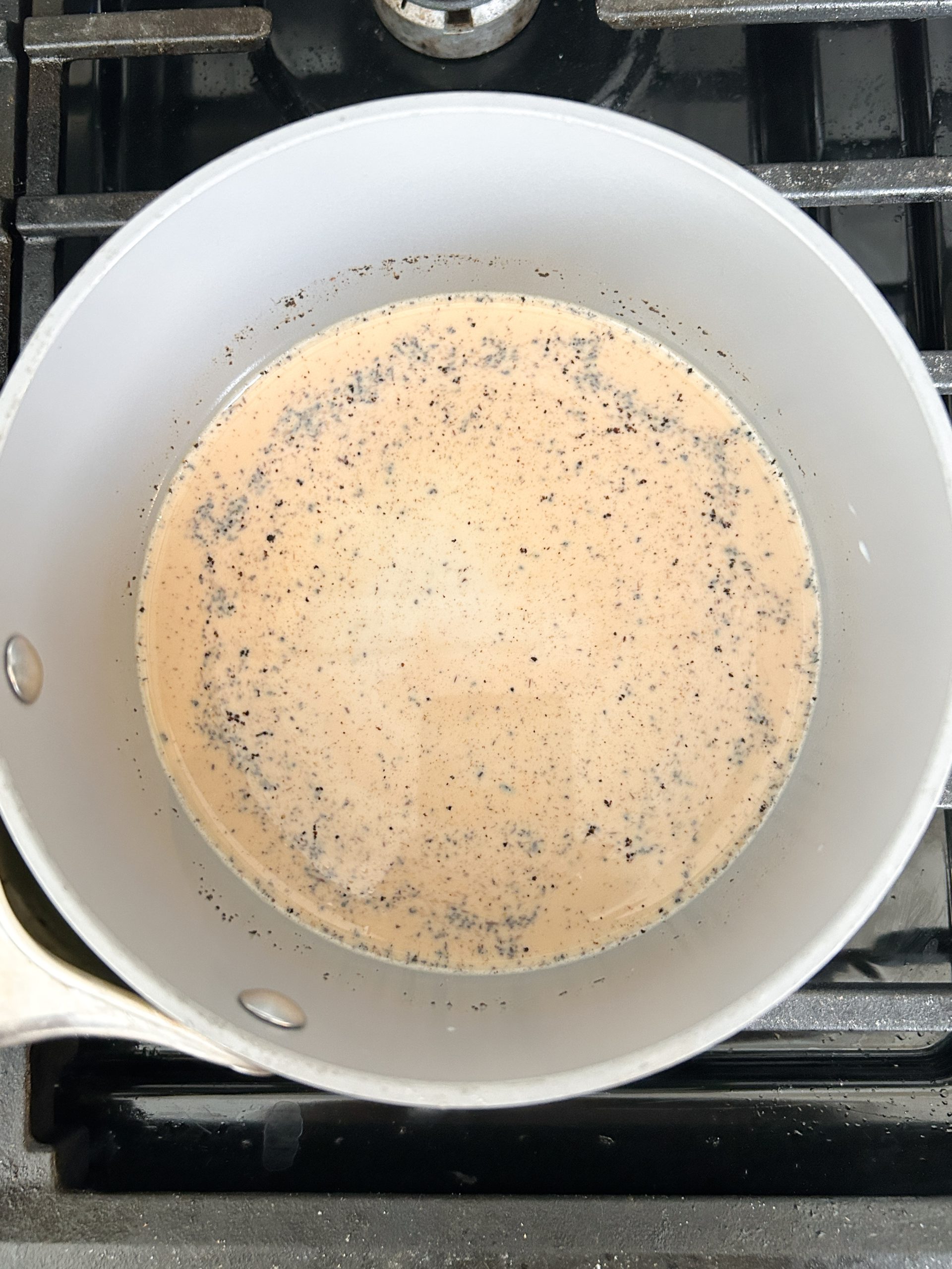 milk and chai in a saucepan