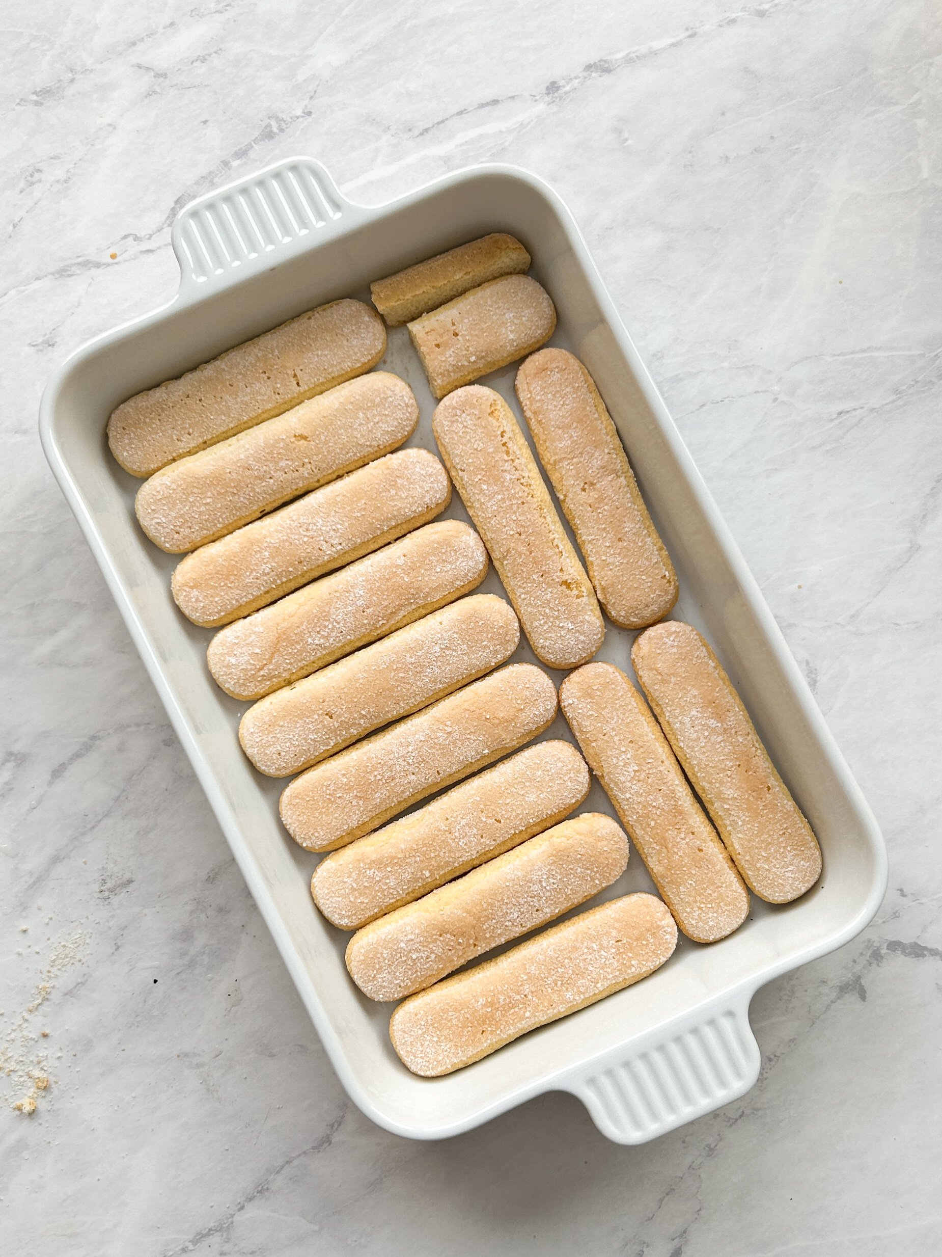 baking ceramic dish with 1 layer of ladyfingers