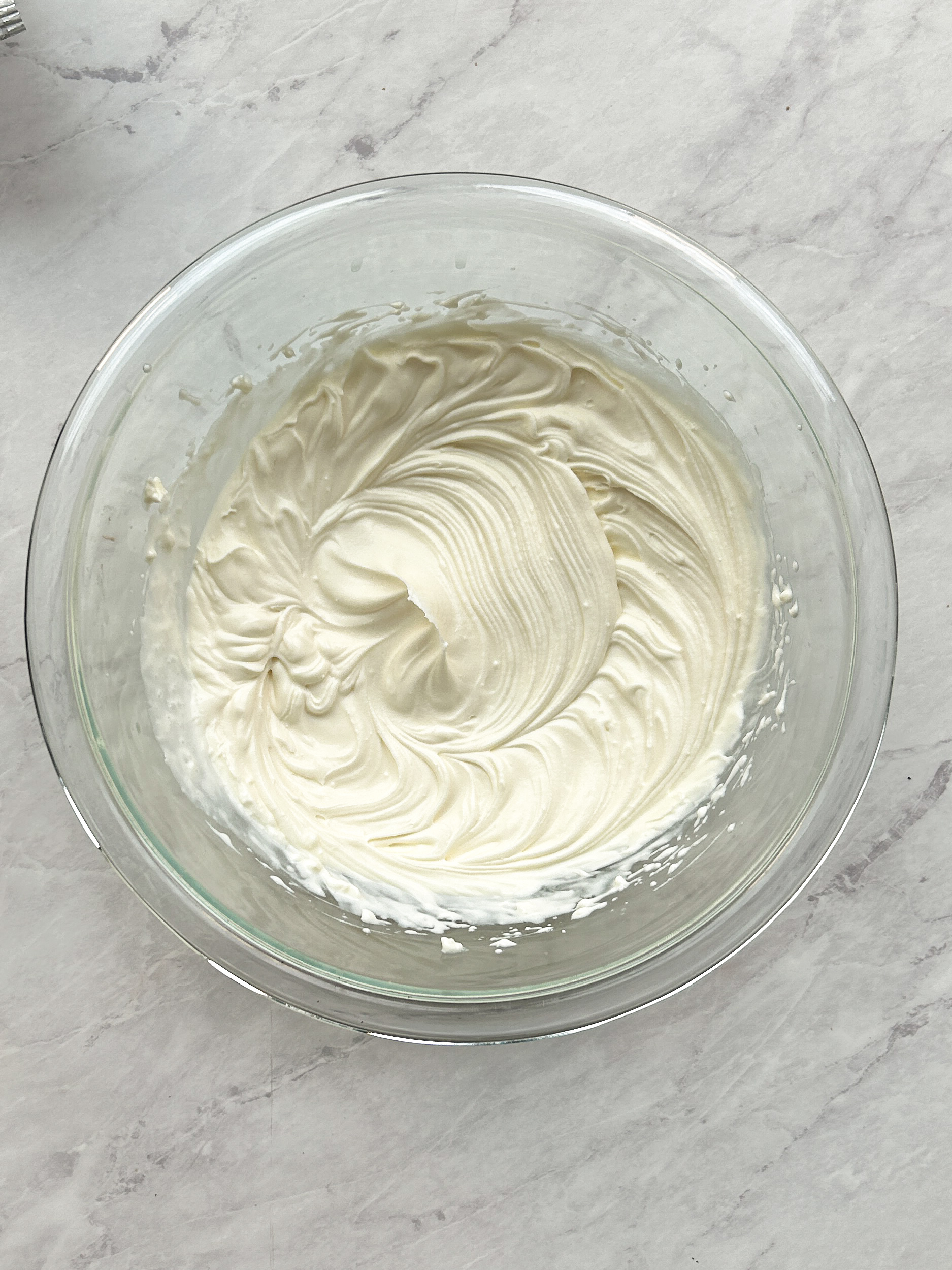 cream cheese filling in a glass bowl