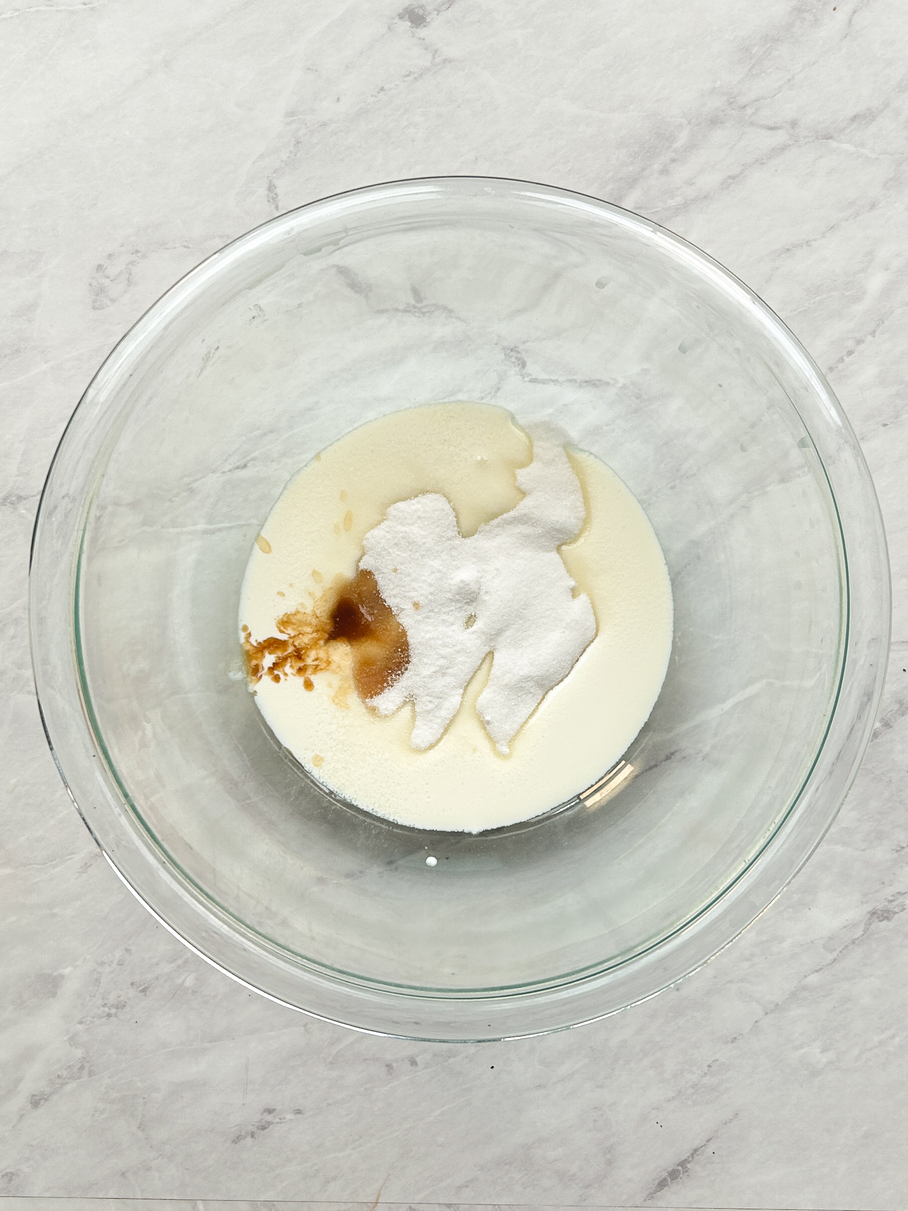 cream and sugar in a glass bowl