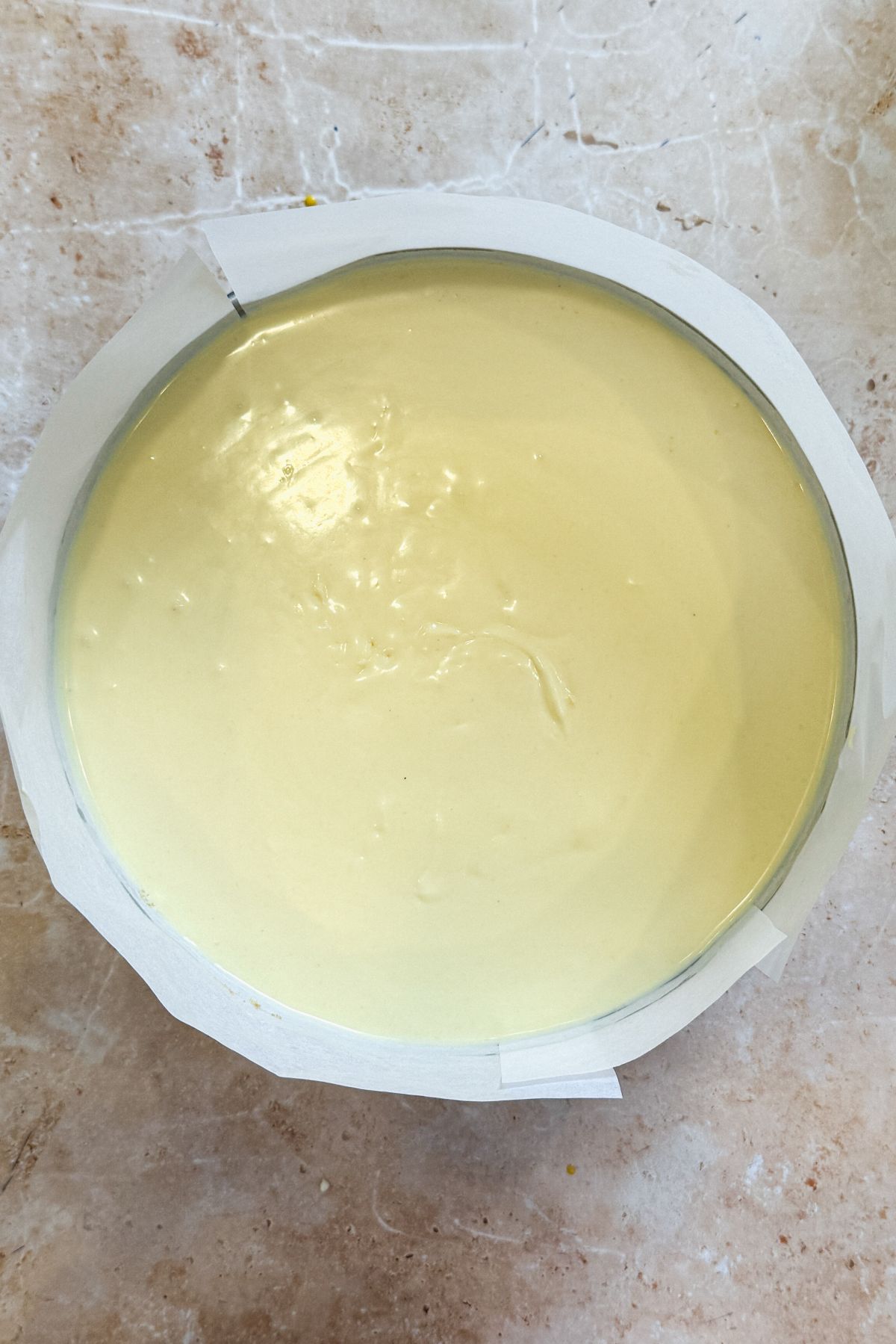 cheesecake batter poured into springform pan