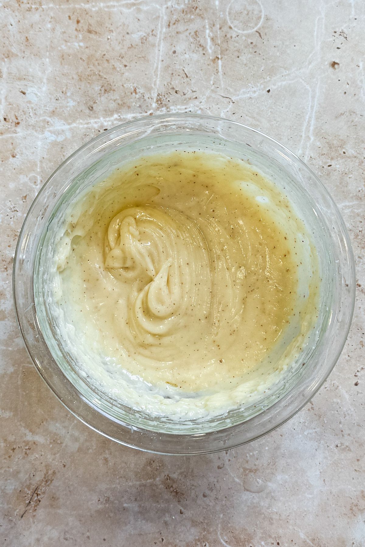 brown butter cream cheese frosting in a glass bowl