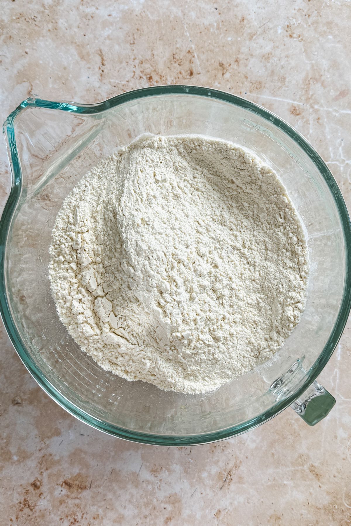 flour and other ingredients added to the bowl