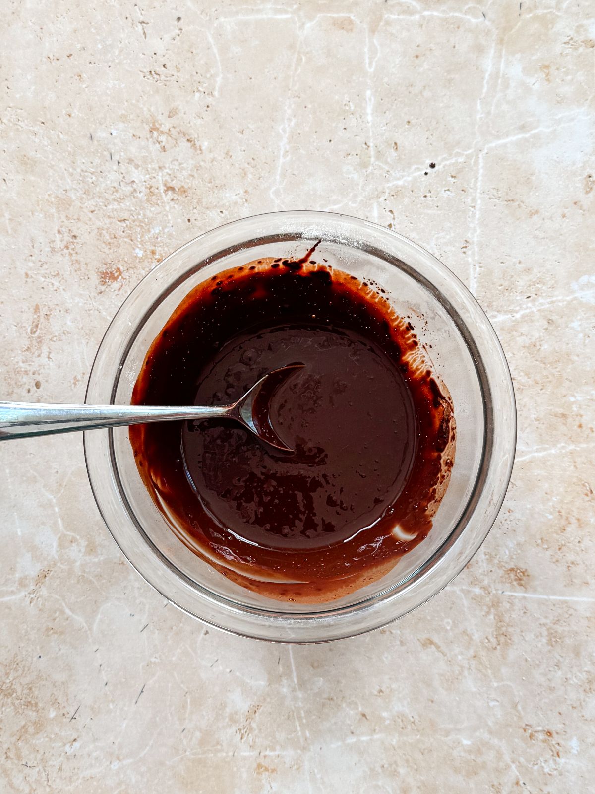 shiny cocoa powder mixture in a small bowl