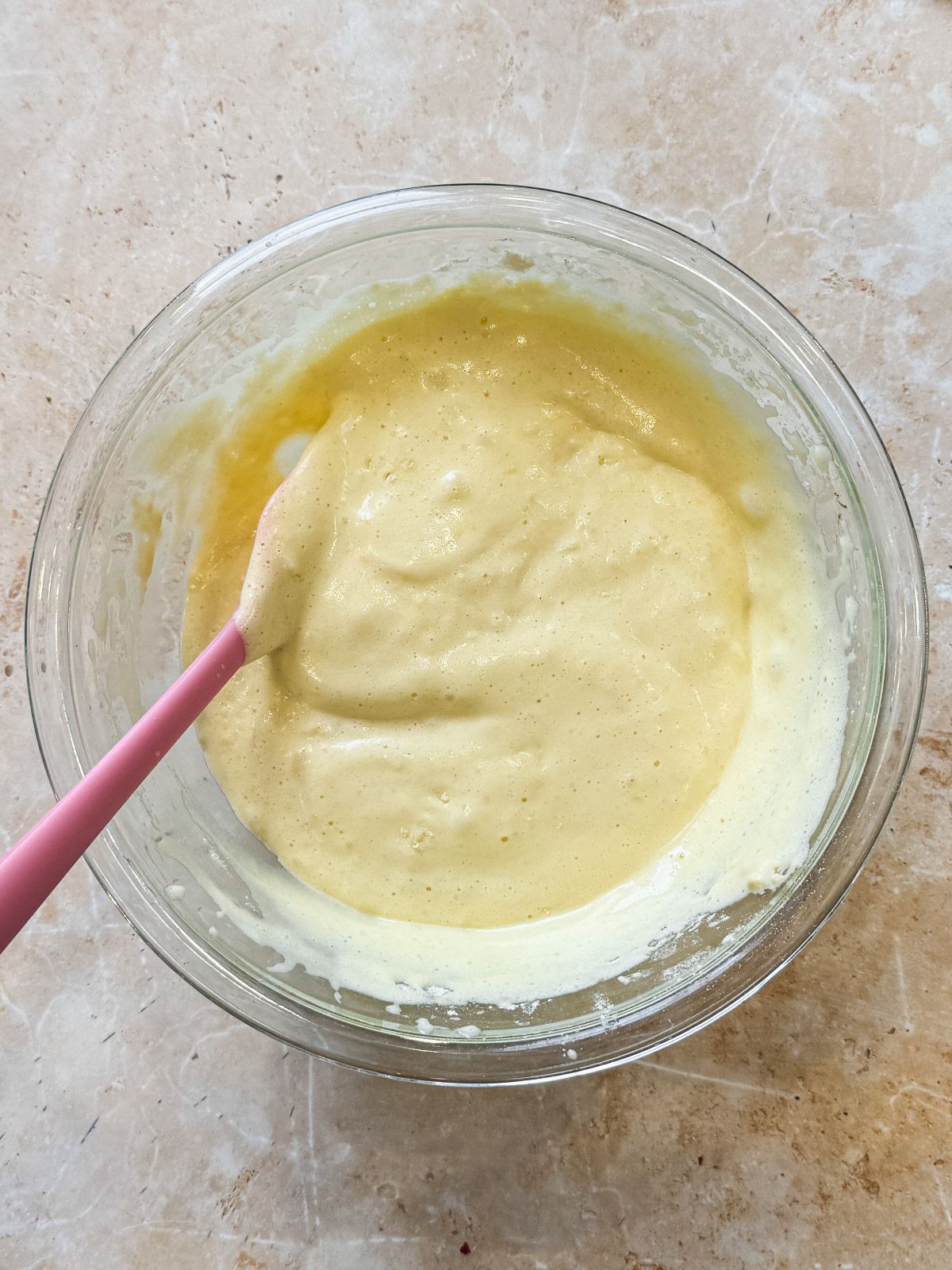 light and fluffy chiffon cake batter in a glass bowl