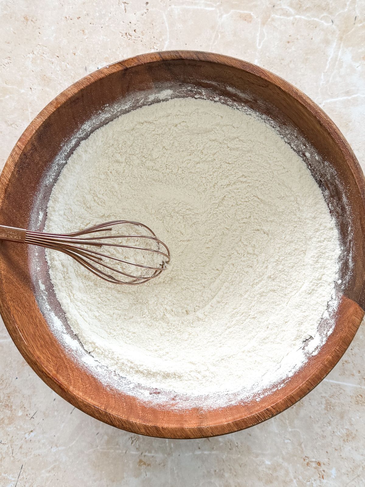 dry ingredients whisked together in a wooden bowl