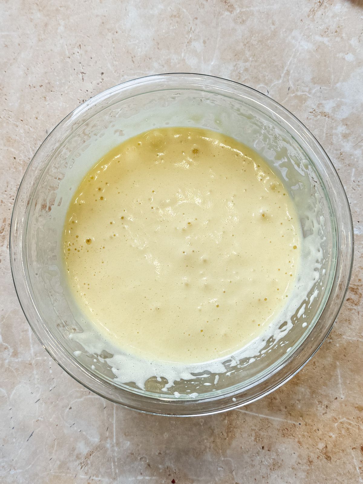 whisked eggs and sugar until light and fluffy in a glass bowl