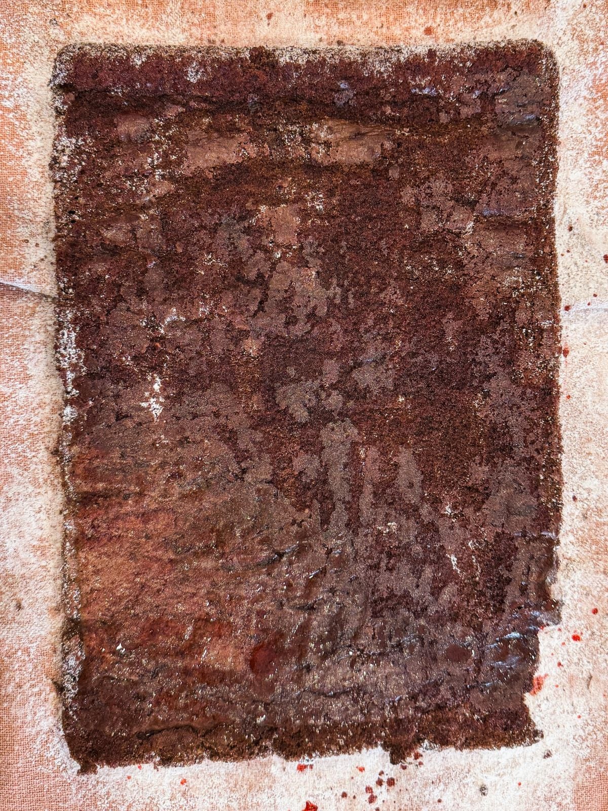 Chocolate genoise sponge baked and brushed with cherry syrup